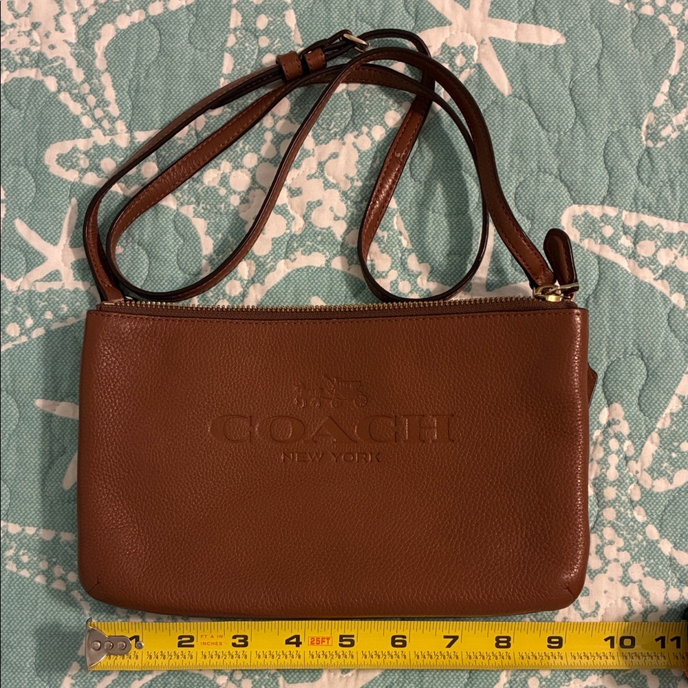Coach Brown Pebbled Leather Lyla Crossbody. Pictures show markings on corners.